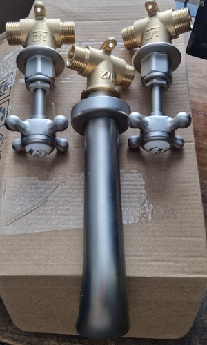 Wall mounted basin taps - mounted,